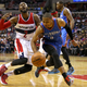 Russell Westbrook #0 of the Oklahoma City Thunder steals the ball from John Wall #2 of the Washington Wizards in the second half at Verizon Center on January 21, 2015 in Washington, DC. The Oklahoma City Thunder won, 105-103, in overtime.
